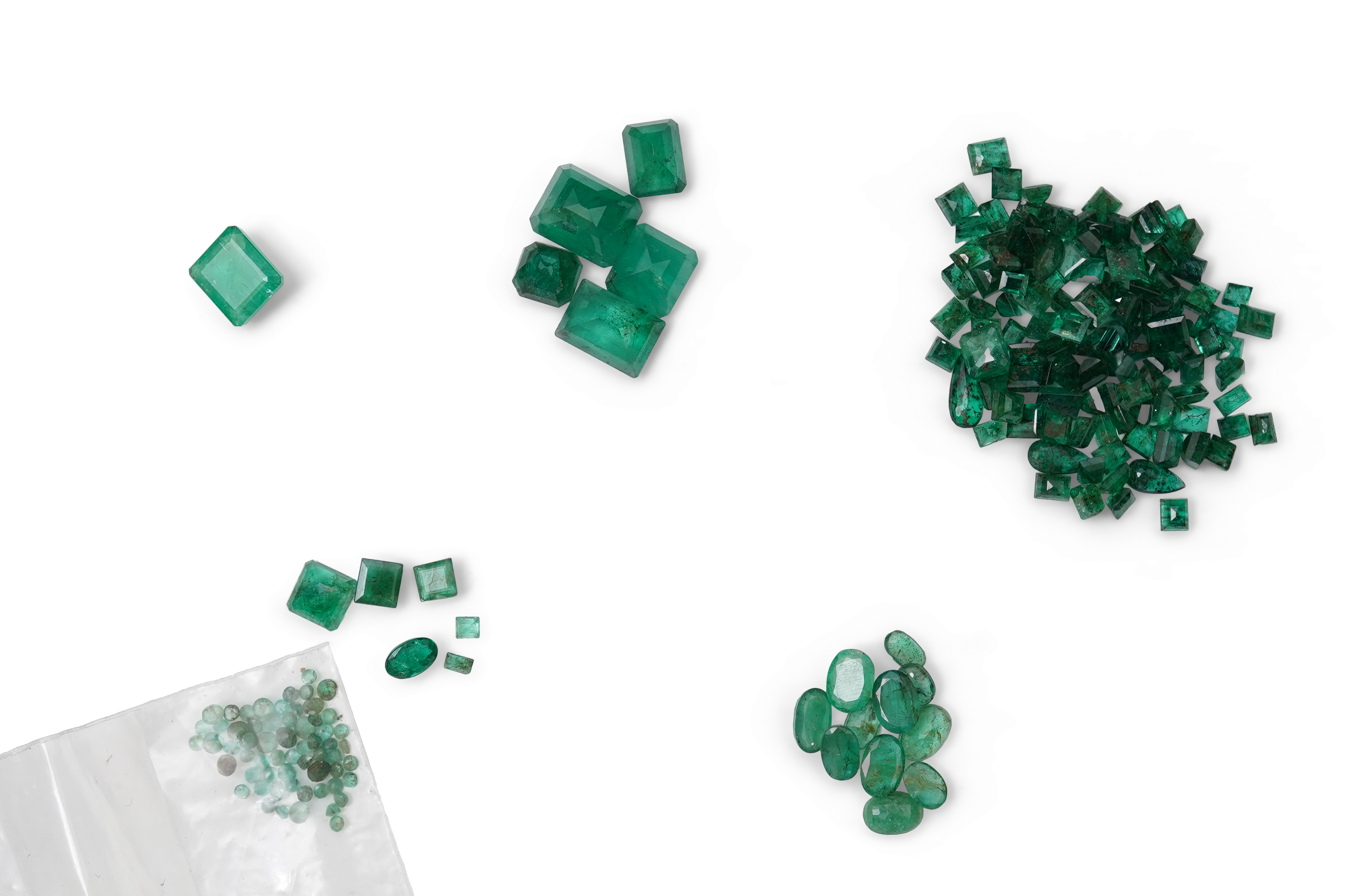 A collection of loose emeralds